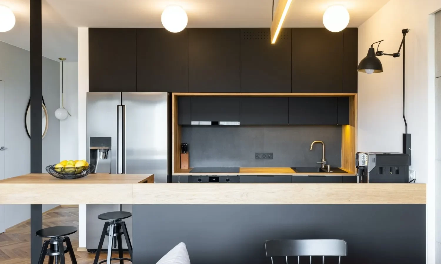 black-wooden-furniture-and-an-industrial-lamp-above-a-coffee-mac-q1tbq8ldyvoxnjgu57qeyaz5v4imgzc9y0ynxofns8
